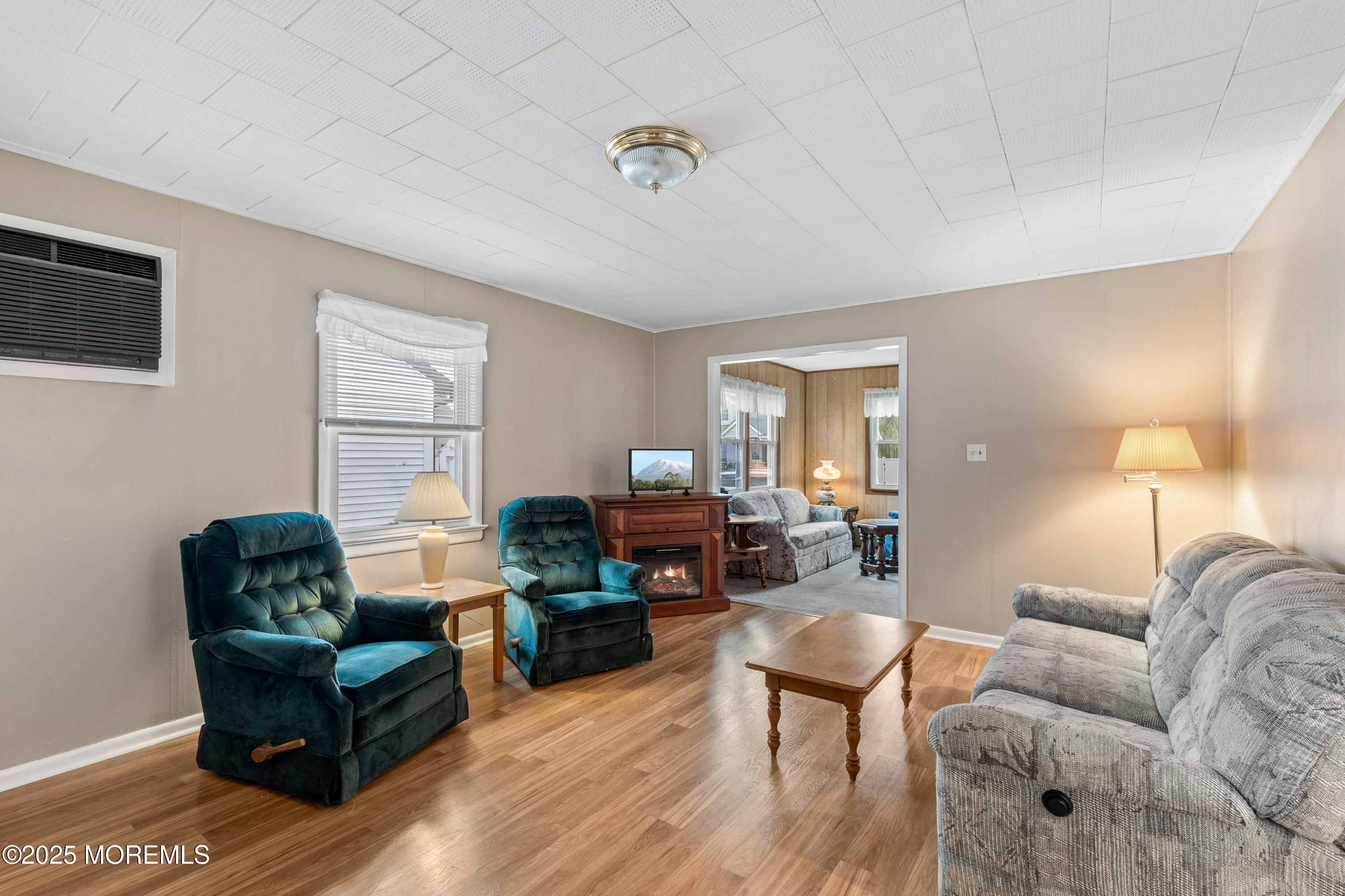 9 Monmouth Place Keyport, NJ 07735 - Photo 11 of 28 a living room with furniture and a wooden floor