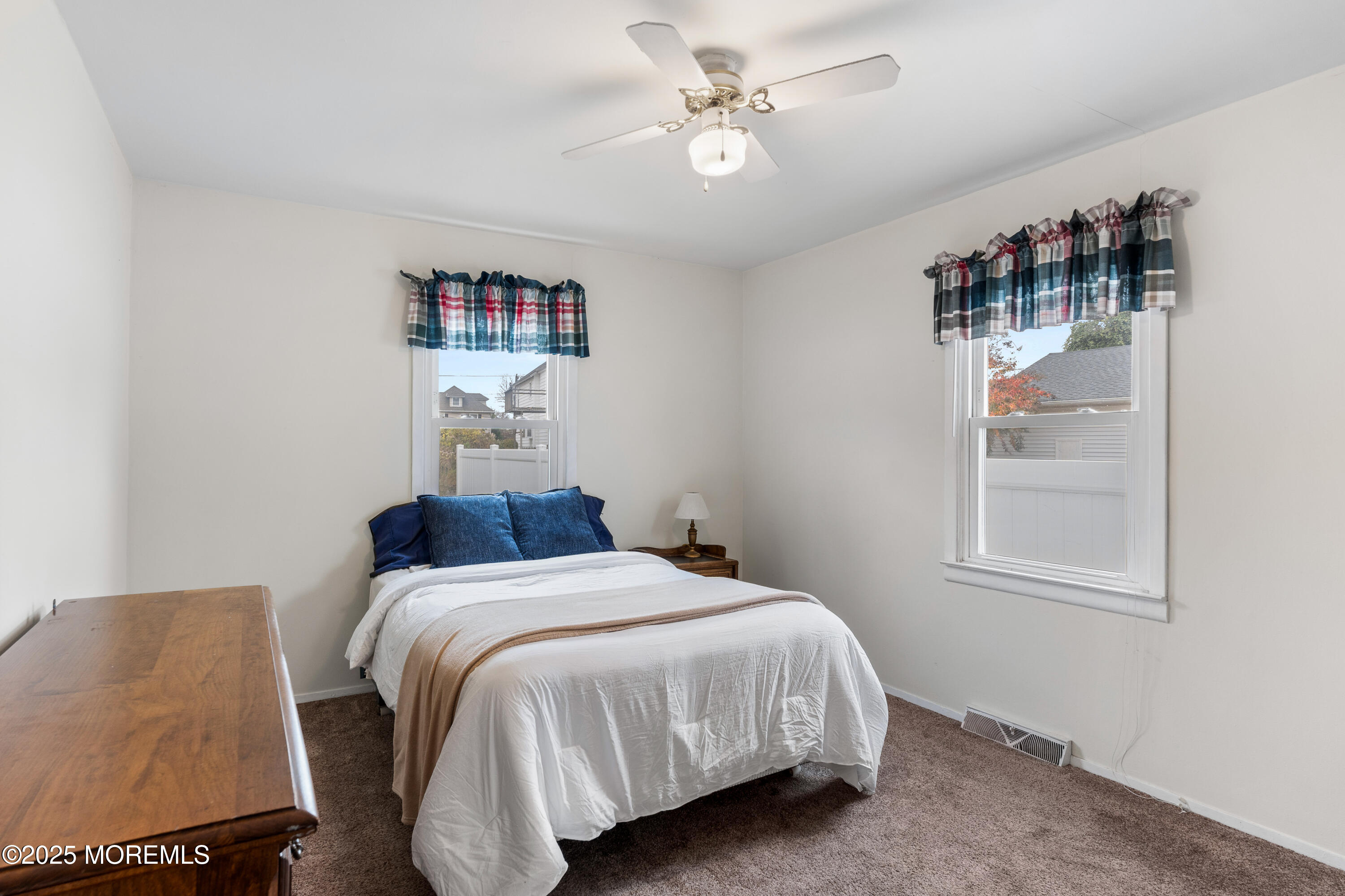 9 Monmouth Place Keyport, NJ 07735 - Photo 14 of 28 a bedroom with a bed and a window