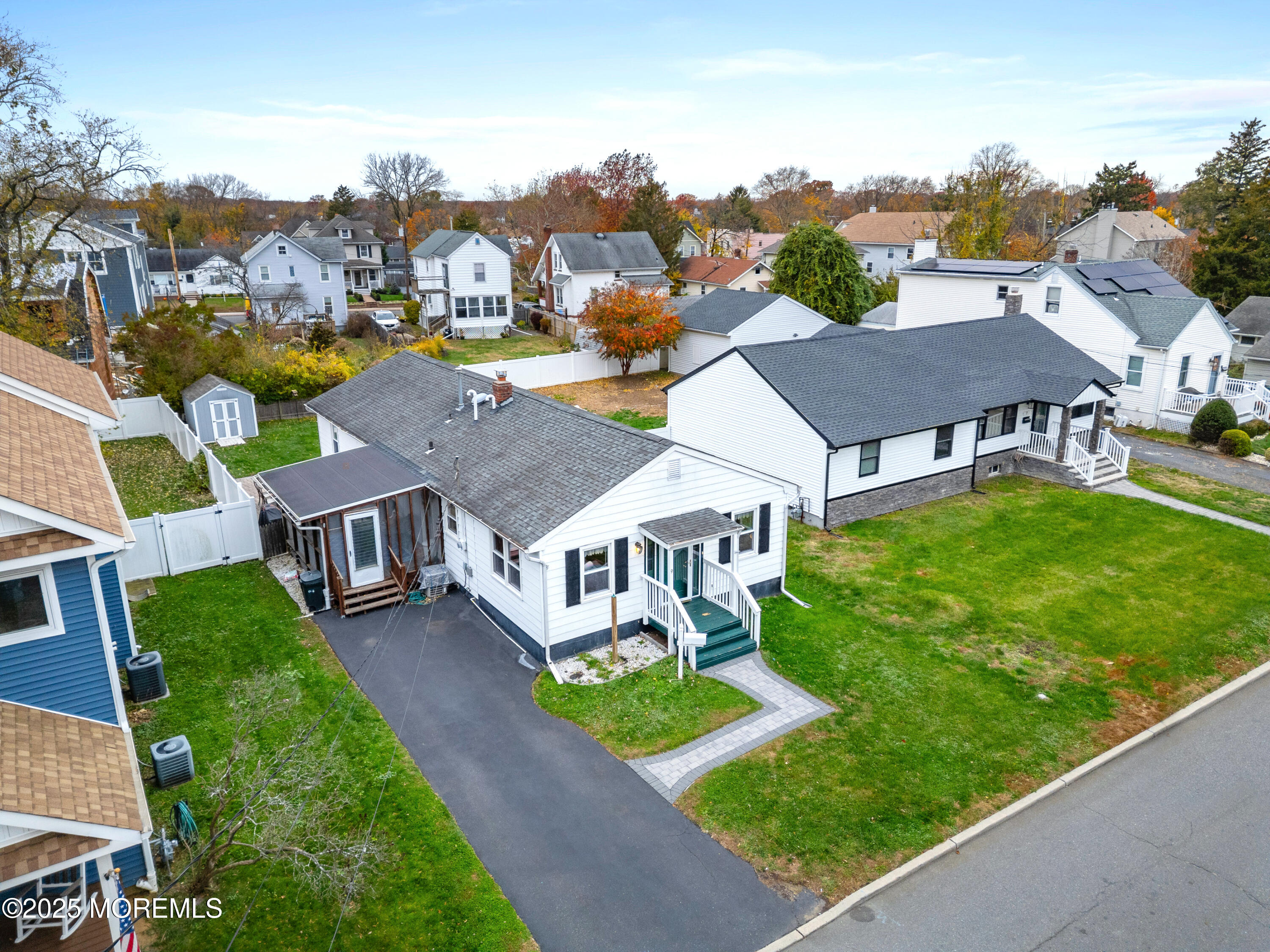 9 Monmouth Place Keyport, NJ 07735 - Photo 22 of 28 an aerial view of a house with a big yard and large trees