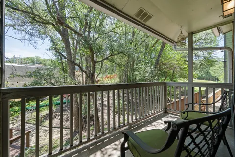 a view of a two chair in the balcony