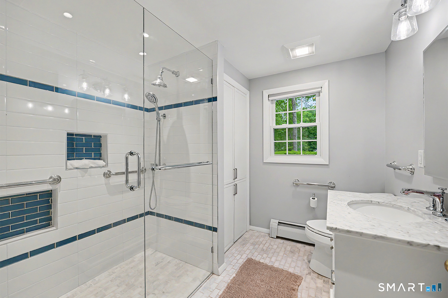 19 Geneva Road Norwalk, CT 06850 - Photo 19 of 33 a bathroom with a bathtub and a shower
