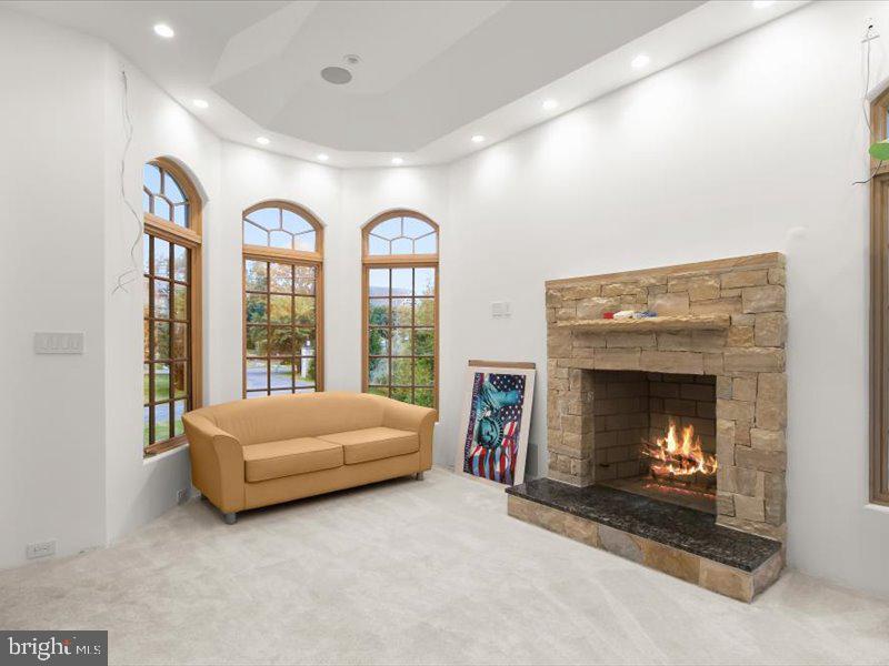 10130 Counselman Road Potomac, MD 20854 - Photo 126 of 135 a living room with furniture and a fireplace