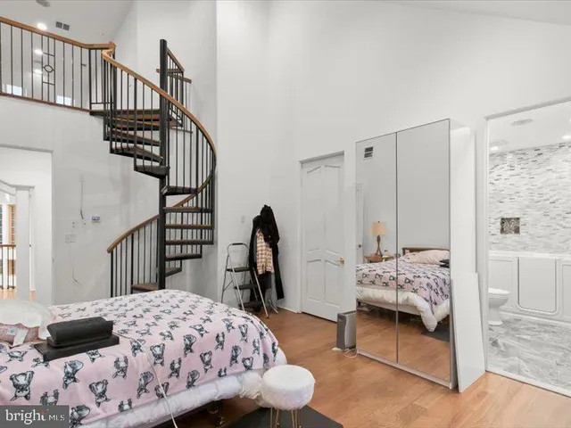 a view of a workspace with furniture