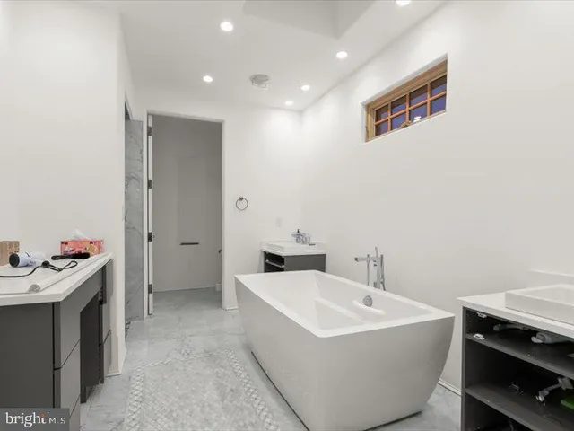 a view of a brick house with a large windows