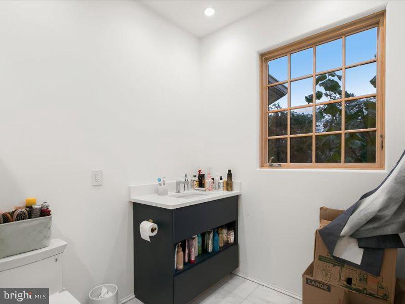 10130 Counselman Road Potomac, MD 20854 - Photo 72 of 135 a view of a room that has a bed and a window in it