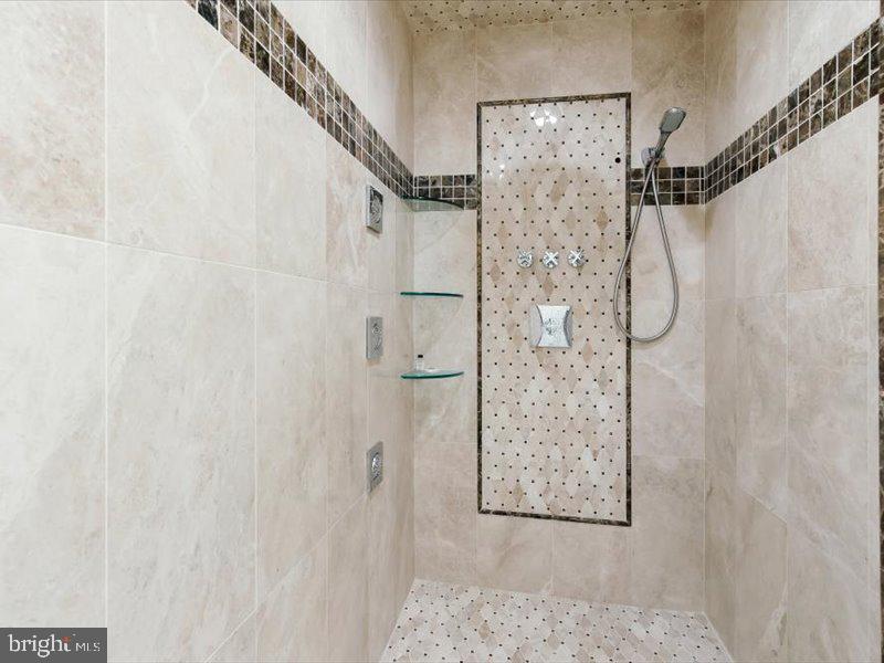 10130 Counselman Road Potomac, MD 20854 - Photo 88 of 135 a bathroom with a shower and a shower