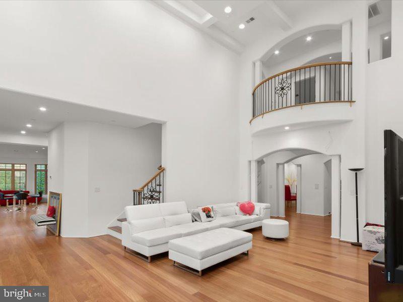 10130 Counselman Road Potomac, MD 20854 - Photo 95 of 135 a living room with furniture and a wooden floor