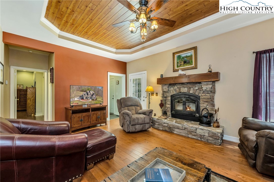 3186-3190 Silas Creek Road Lansing, NC 28643 - Photo 12 of 50 a living room with furniture and a fireplace