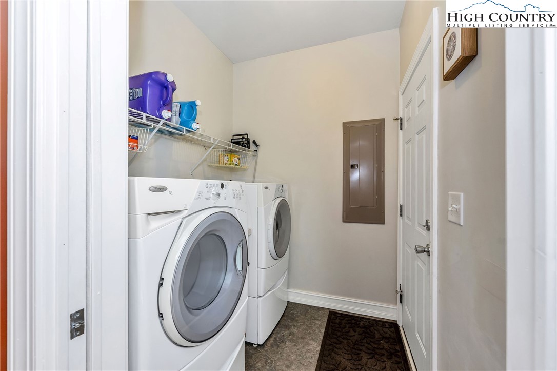3186-3190 Silas Creek Road Lansing, NC 28643 - Photo 23 of 50 a utility room with dryer and washer