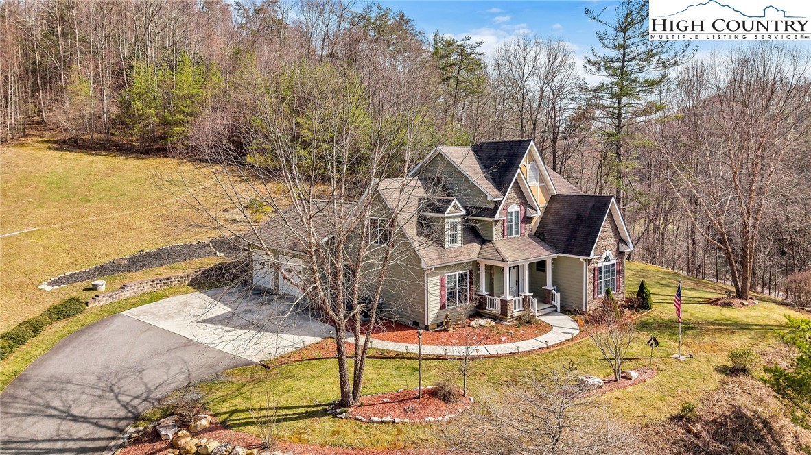 3186-3190 Silas Creek Road Lansing, NC 28643 - Photo 5 of 50 a view of a house with backyard