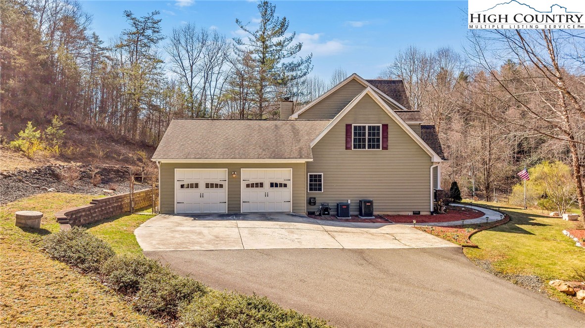 3186-3190 Silas Creek Road Lansing, NC 28643 - Photo 7 of 50 a view of house with outdoor space