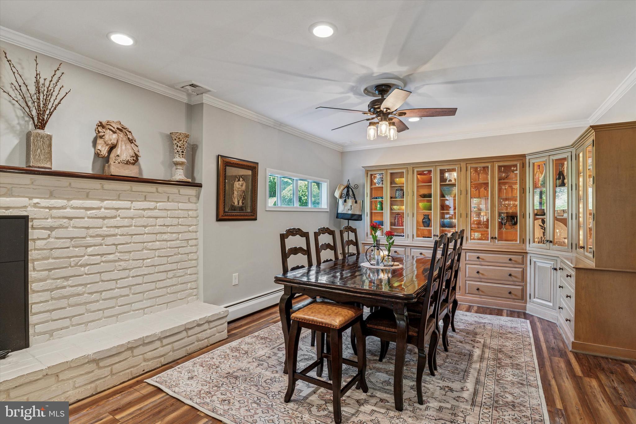 432 Spring Valley Road Media, PA 19063 - Photo 13 of 46 a view of a dining room with furniture window and wooden floor