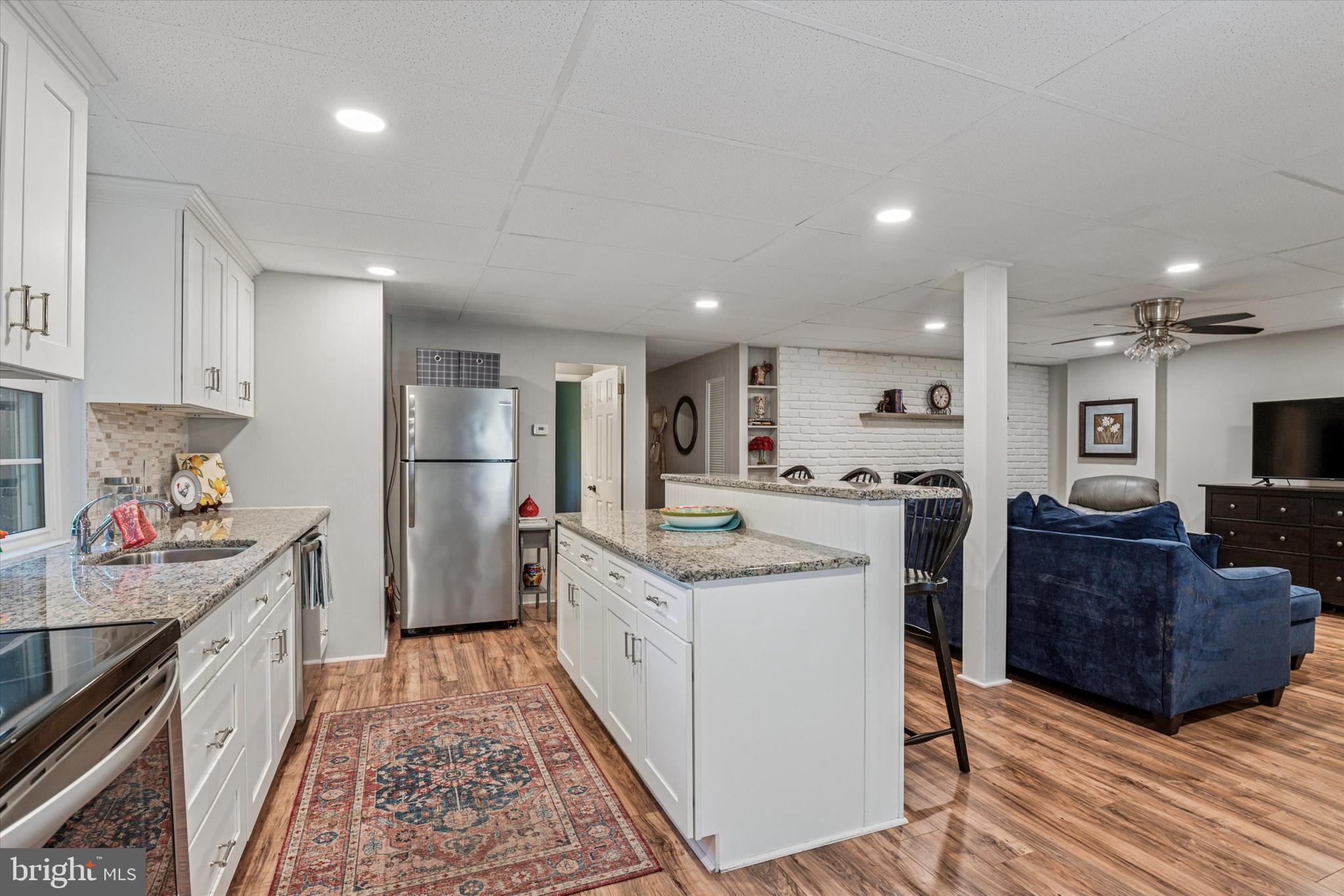 432 Spring Valley Road Media, PA 19063 - Photo 26 of 46 a kitchen that has a lot of cabinets a sink and appliances in it