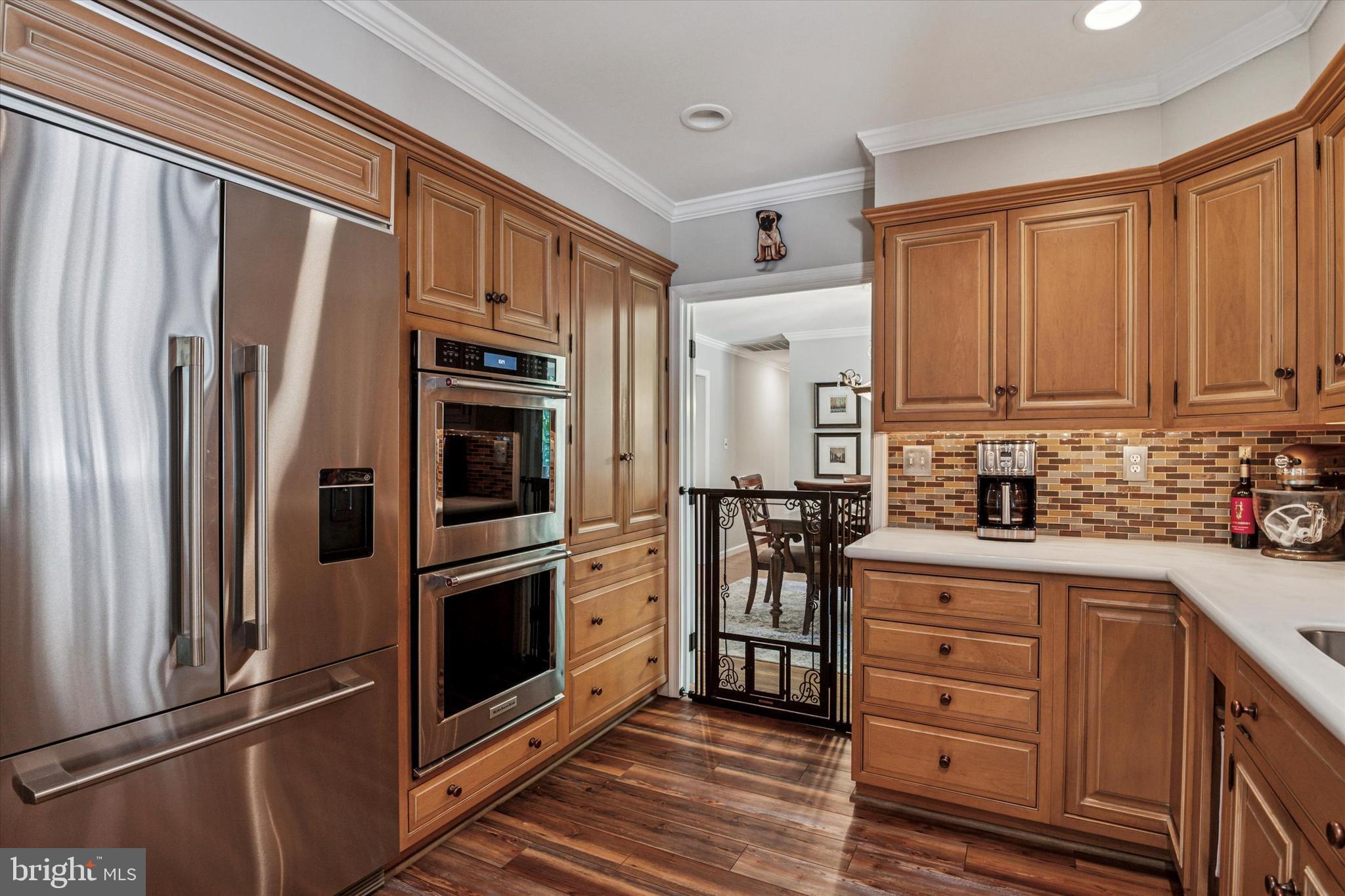 432 Spring Valley Road Media, PA 19063 - Photo 10 of 46 a kitchen with granite countertop stainless steel appliances a refrigerator stove top oven and sink