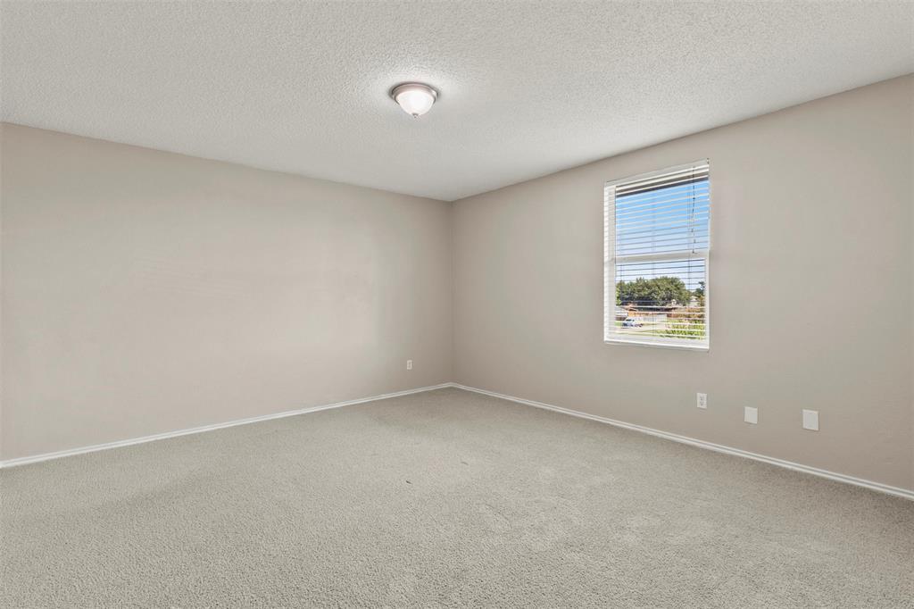 3004 Deer Ridge Drive Rockwall, TX 75032 - Photo 14 of 25 an empty room with a window
