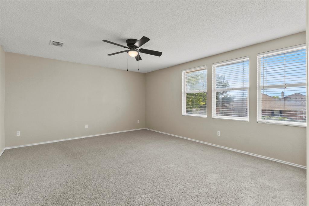 3004 Deer Ridge Drive Rockwall, TX 75032 - Photo 8 of 25 a view of an empty room with a window