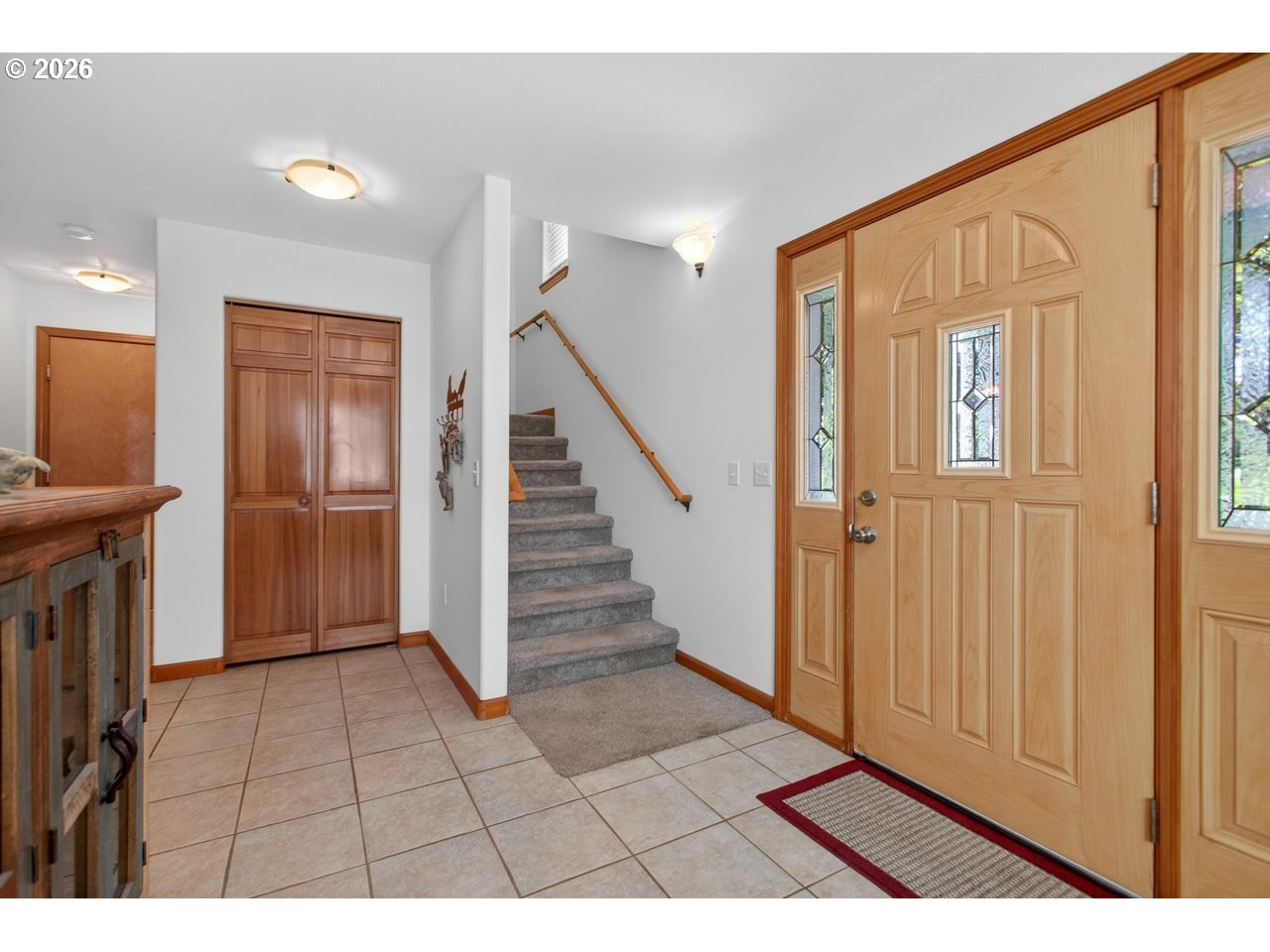 3956 Beach Loop Drive Southwest Bandon, OR 97411 - Photo 13 of 48 a view interior of a house with wooden floor and stairs
