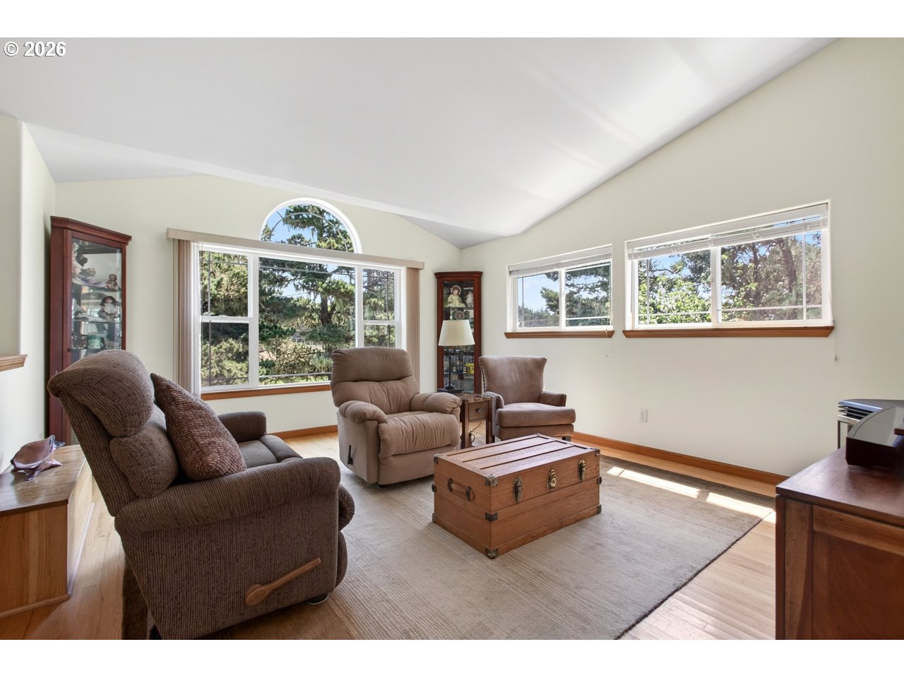 3956 Beach Loop Drive Southwest Bandon, OR 97411 - Photo 14 of 48 a living room with furniture and a window