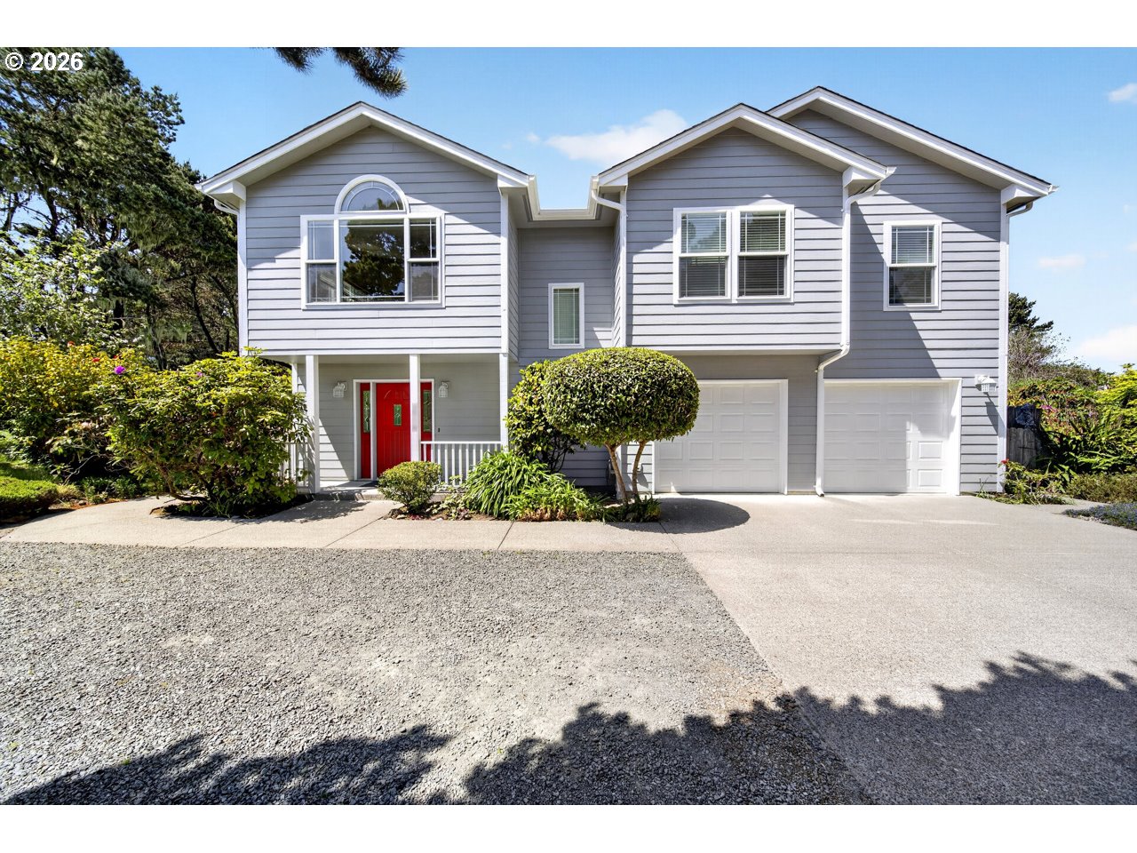 3956 Beach Loop Drive Southwest Bandon, OR 97411 - Photo 2 of 48 a front view of a house with yard