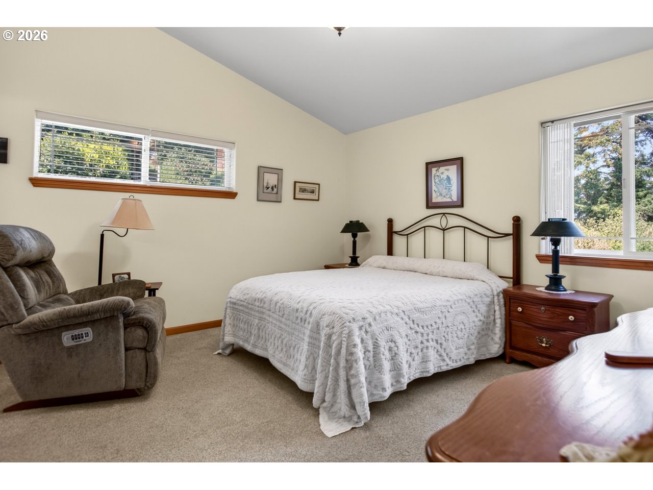 3956 Beach Loop Drive Southwest Bandon, OR 97411 - Photo 25 of 48 a bedroom with a bed and a couch