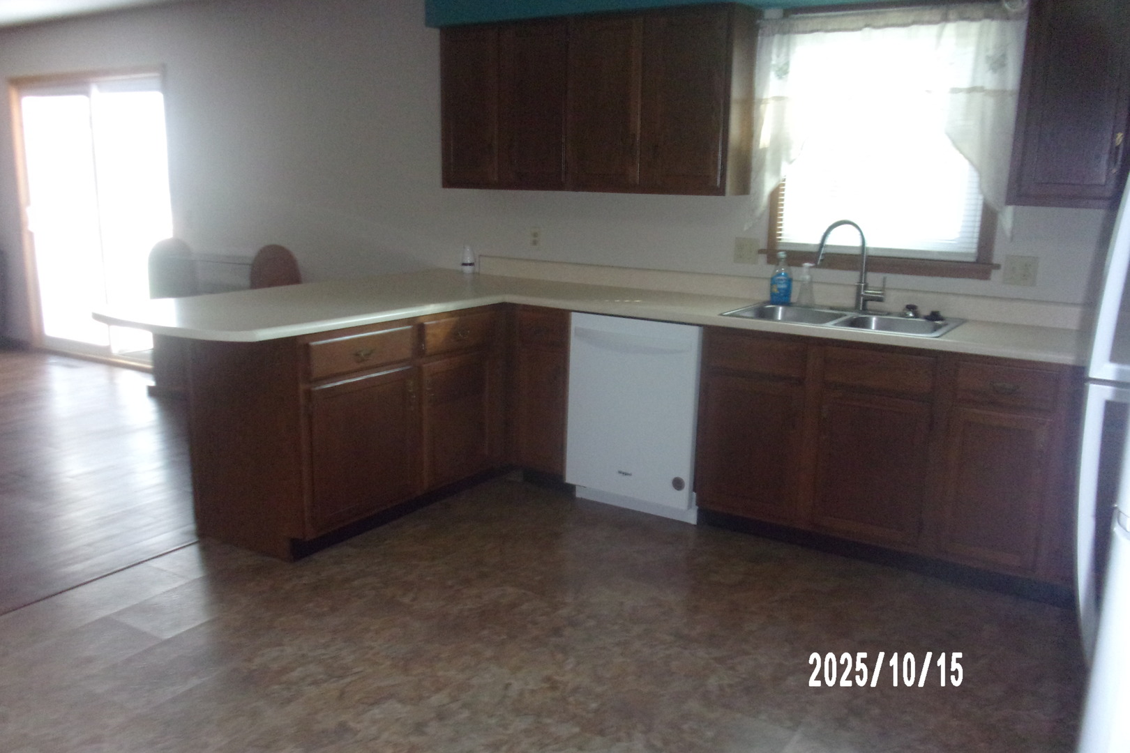 707 East Ash Street Watseka, IL 60970 - Photo 12 of 25 a kitchen with a sink and cabinets