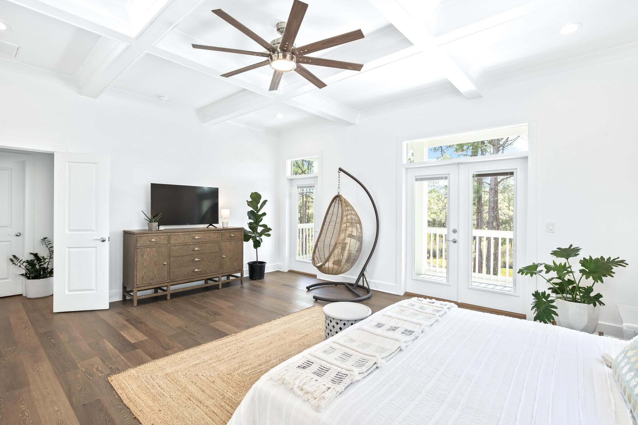 391 Matt's Way Santa Rosa Beach, FL 32459 - Photo 25 of 61 a bedroom with a bed and a flat screen tv