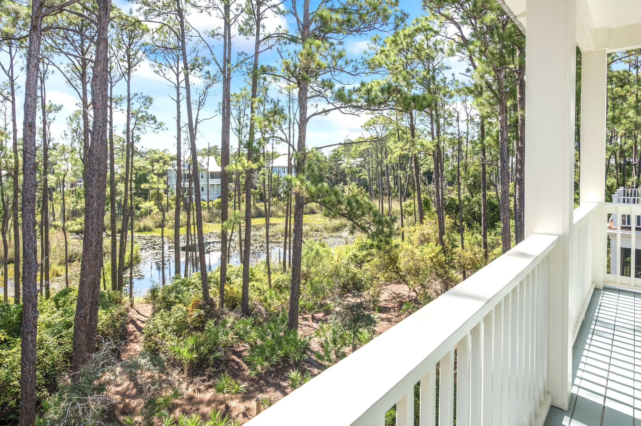 391 Matt's Way Santa Rosa Beach, FL 32459 - Photo 28 of 61 a view of balcony and trees