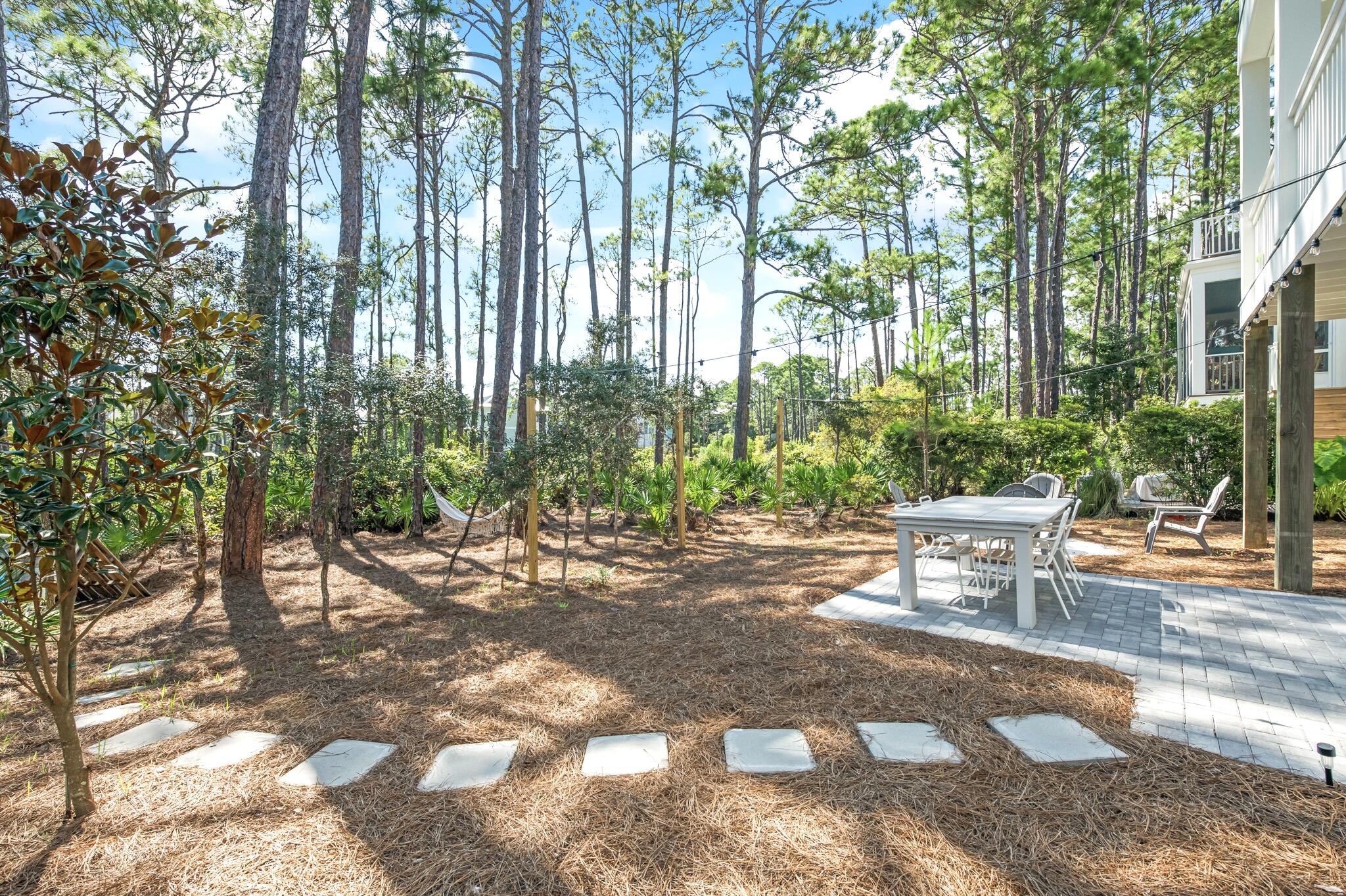 391 Matt's Way Santa Rosa Beach, FL 32459 - Photo 59 of 61 a view of a backyard with sitting area
