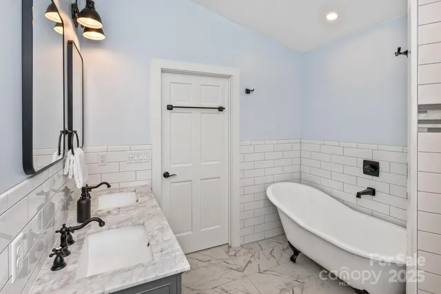a bathroom with a sink and a tub
