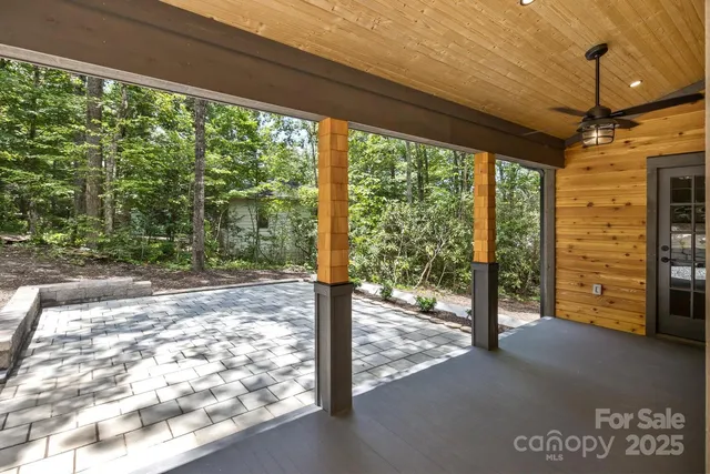 a view of a porch with hardwood