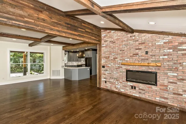 a kitchen with a stove and a microwave
