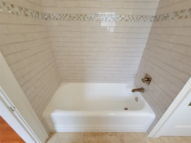 a bathroom with a bathtub