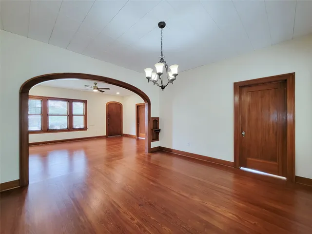 a view of a livingroom with wooden floor