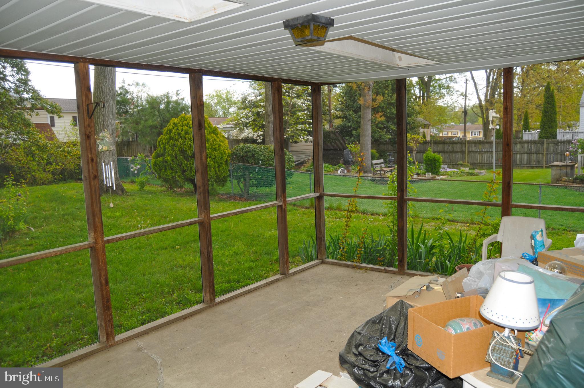 523 Crisfield Road Baltimore, MD 21220 - Photo 7 of 15 Screened in porch to enjoy the afternoon breeze