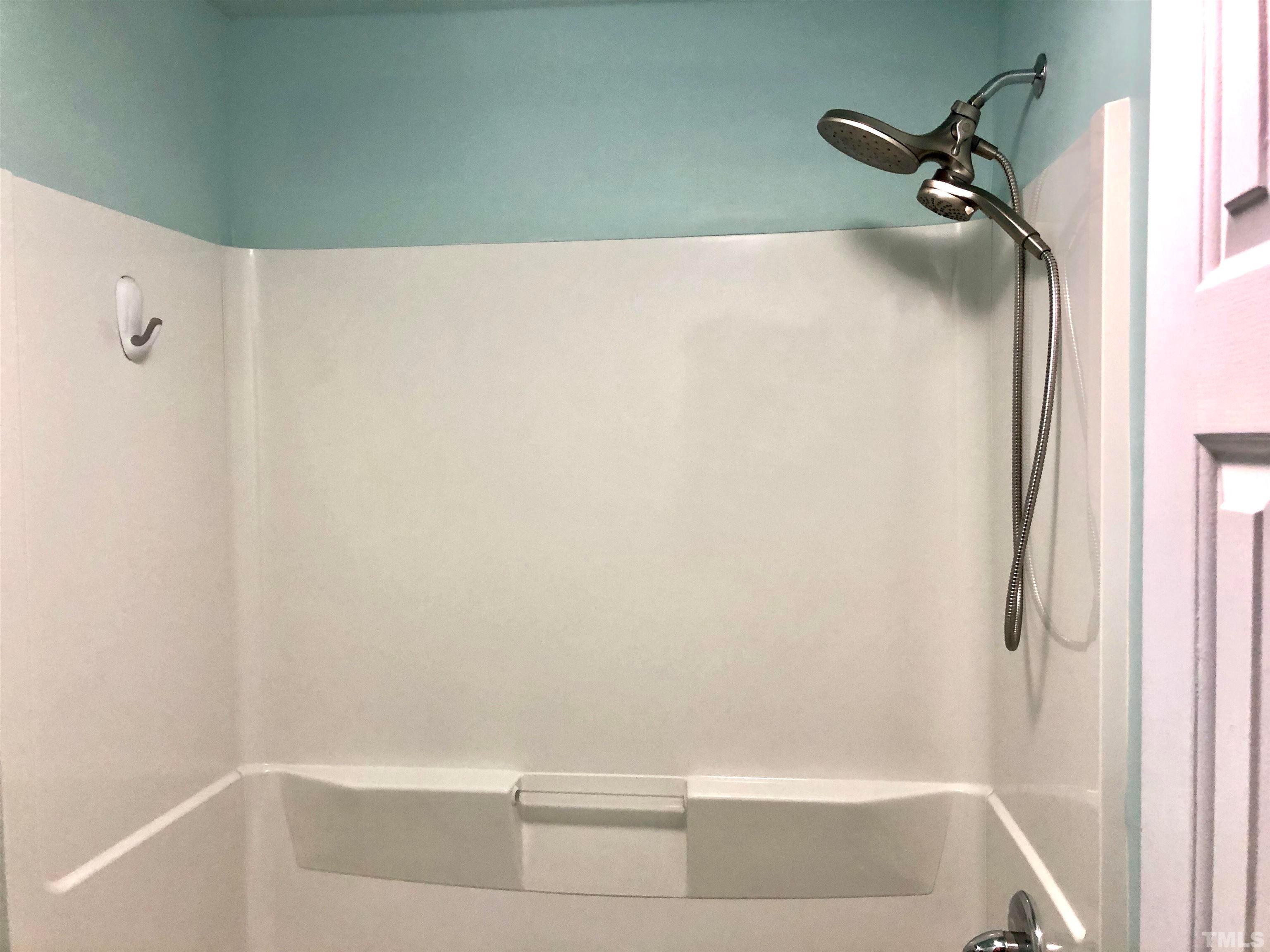 5629 Hamstead Crossing Raleigh, NC 27612 - Photo 25 of 28 a bathroom with a shower
