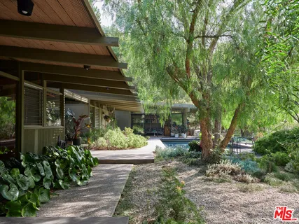 a view of a house with a garden