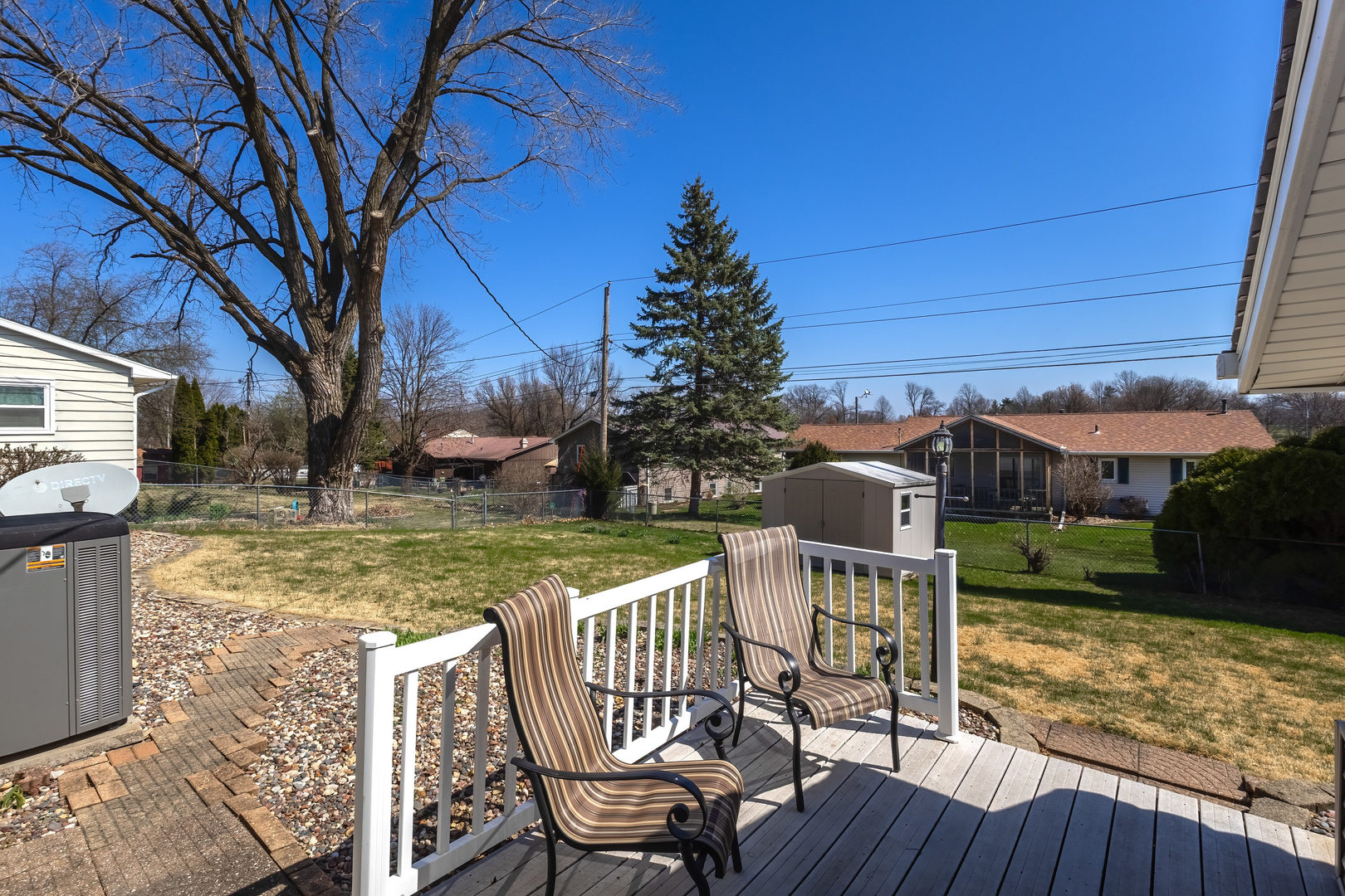 2690 9th Street East Moline, IL 61244 - Photo 16 of 19 a view of a chair and tables in the patio