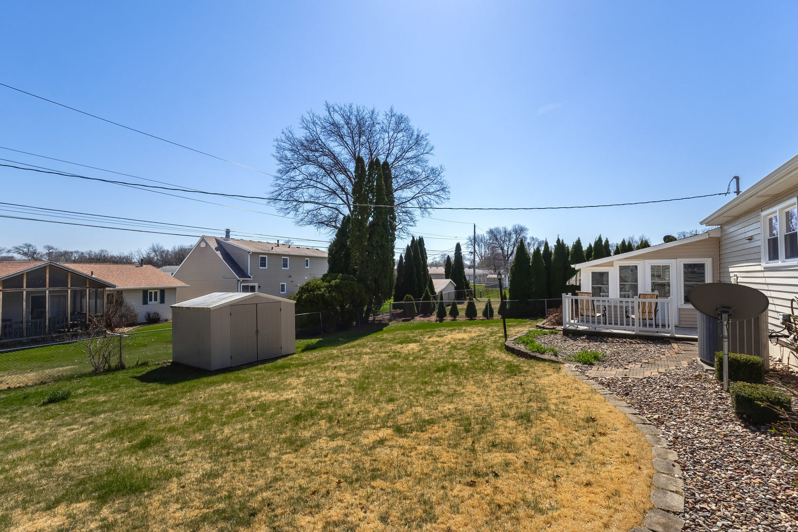 2690 9th Street East Moline, IL 61244 - Photo 18 of 19 a house view with a backyard space