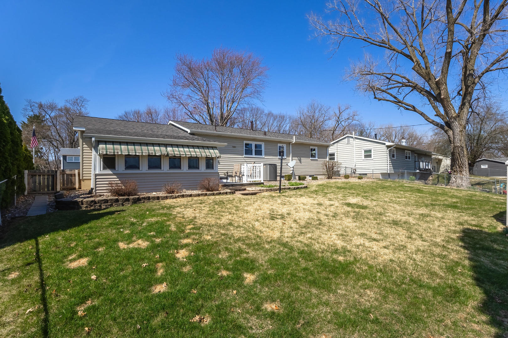 2690 9th Street East Moline, IL 61244 - Photo 19 of 19 a view of a house with a yard