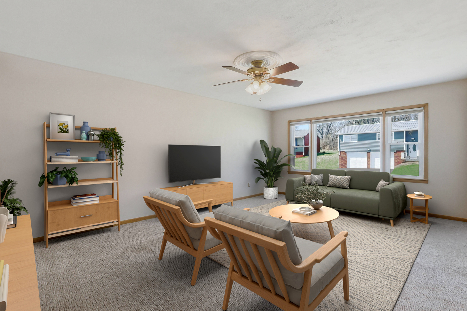 2690 9th Street East Moline, IL 61244 - Photo 5 of 19 a living room with furniture and a flat screen tv