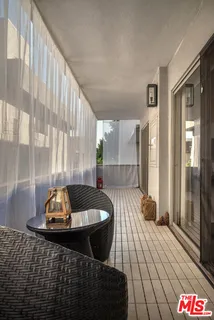 a living room with a couch and a table