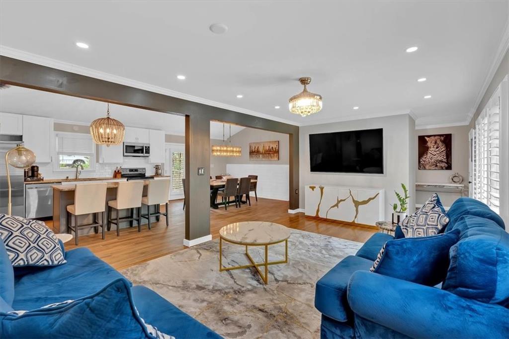 2 Milam Street Cartersville, GA 30120 - Photo 14 of 57 a living room with furniture kitchen view and a large window