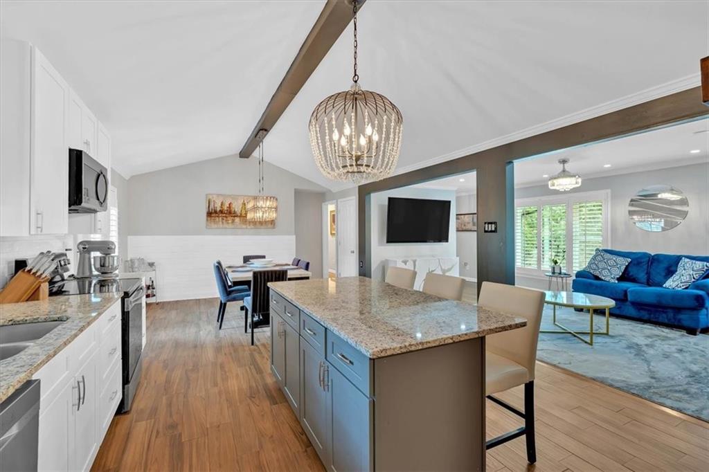 2 Milam Street Cartersville, GA 30120 - Photo 17 of 57 a view of a dining room with furniture window and wooden floor