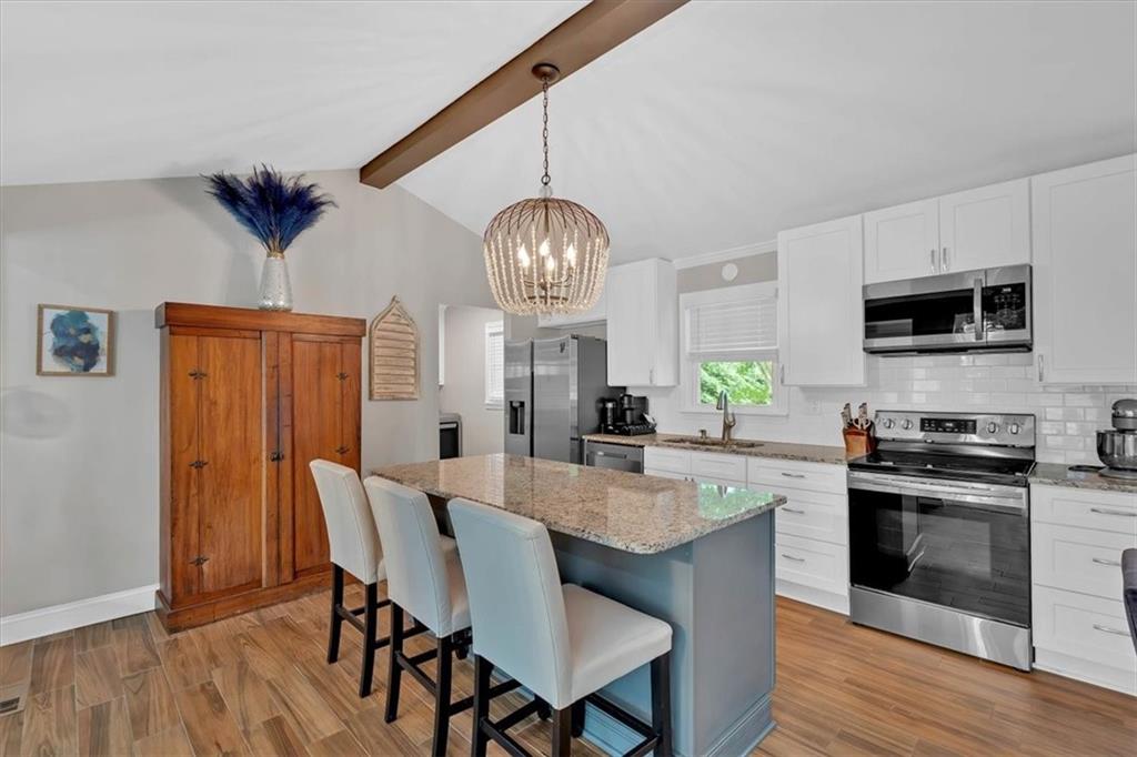 2 Milam Street Cartersville, GA 30120 - Photo 18 of 57 a view of a dining room with furniture window and wooden floor