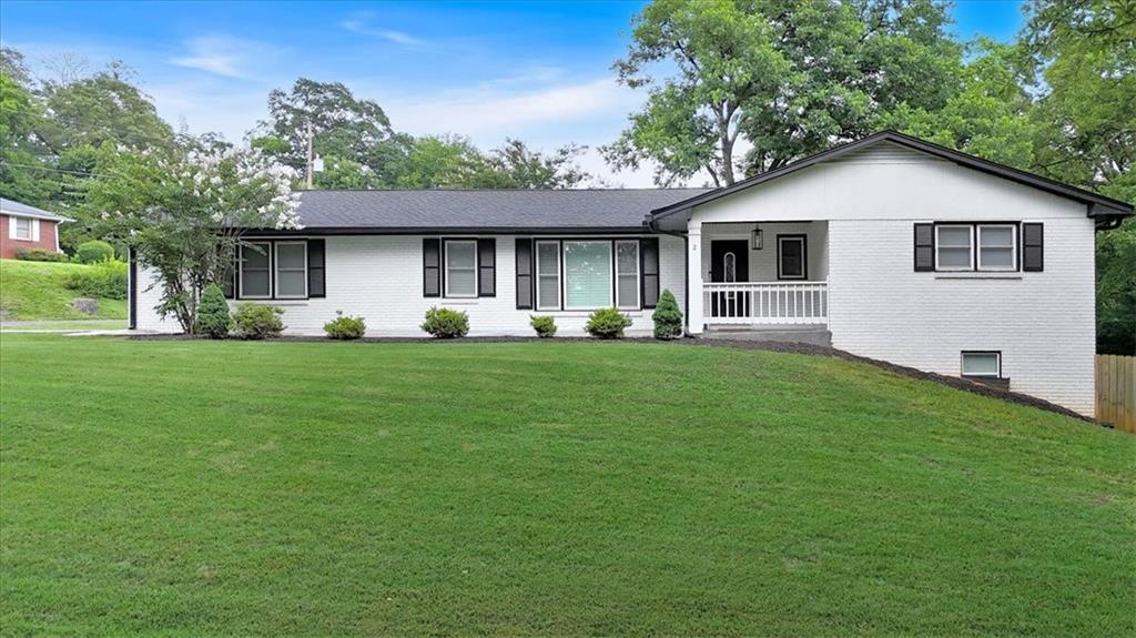 2 Milam Street Cartersville, GA 30120 - Photo 2 of 57 a front view of house with yard and green space