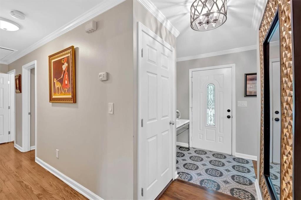 2 Milam Street Cartersville, GA 30120 - Photo 24 of 57 a view of a hallway with wooden floor and a livingroom view