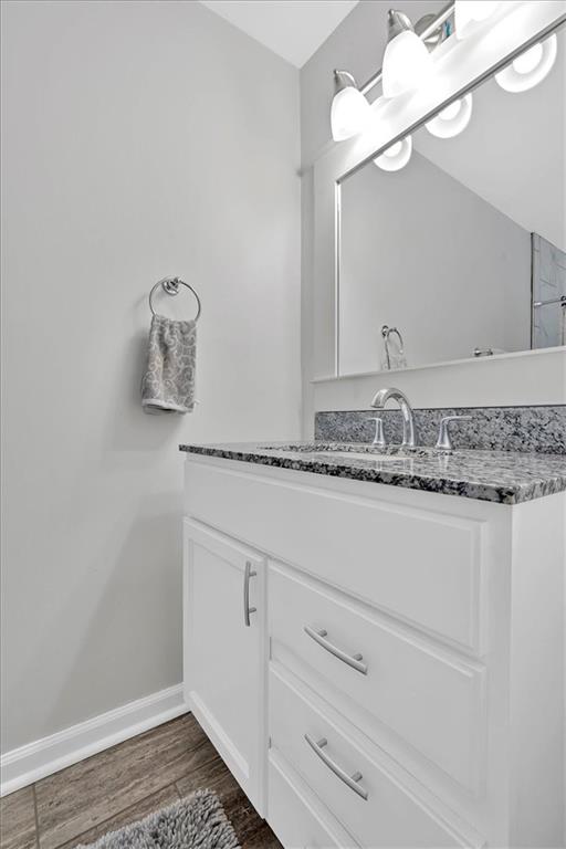 2 Milam Street Cartersville, GA 30120 - Photo 28 of 57 a bathroom with a sink and a mirror