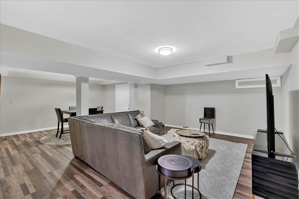 2 Milam Street Cartersville, GA 30120 - Photo 37 of 57 a living room with furniture and a wooden floor