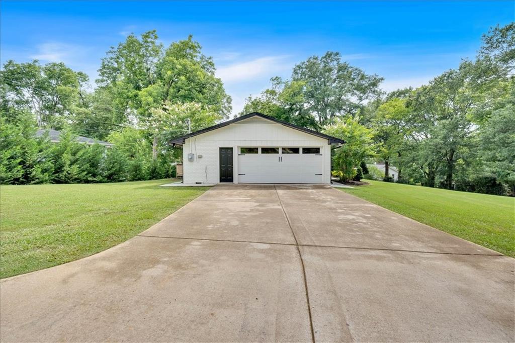2 Milam Street Cartersville, GA 30120 - Photo 49 of 57 a front view of a house with yard