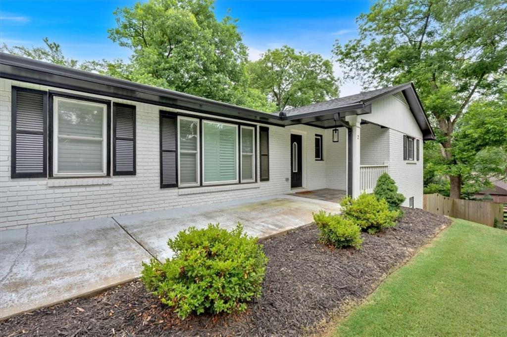 2 Milam Street Cartersville, GA 30120 - Photo 7 of 57 a front view of a house with garden